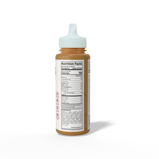 Bottle of Chick Sauce by Drench It Clean showing the sauce’s label and clear plastic container on a white background.